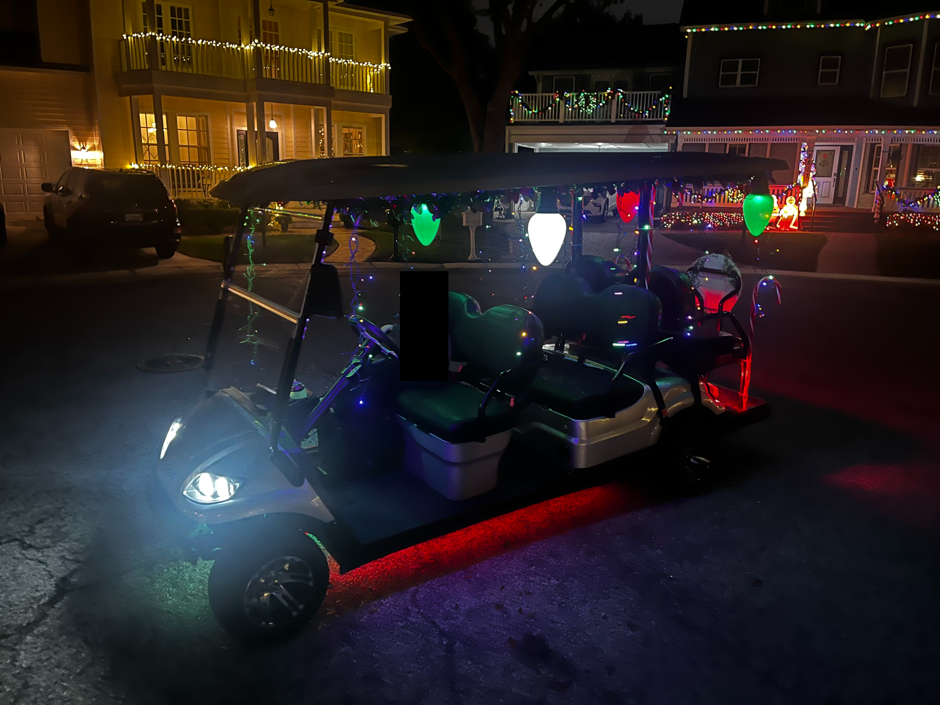 A festive display I made out of a golf cart to participate in a golf card parade.